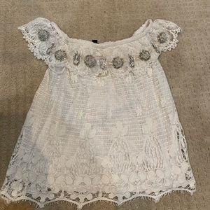 Women’s off shoulder crochet style shirt with stones. New.